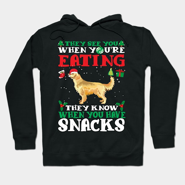 Christmas Dog Eating Snacks Hoodie by CyberpunkTees